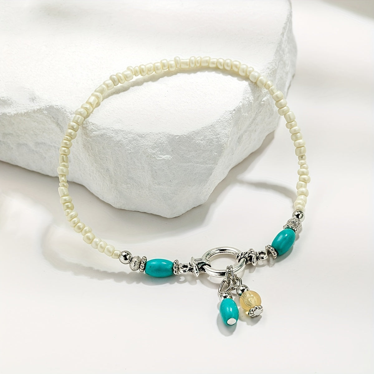 Maëlys | Cheville turquoise à pampilles