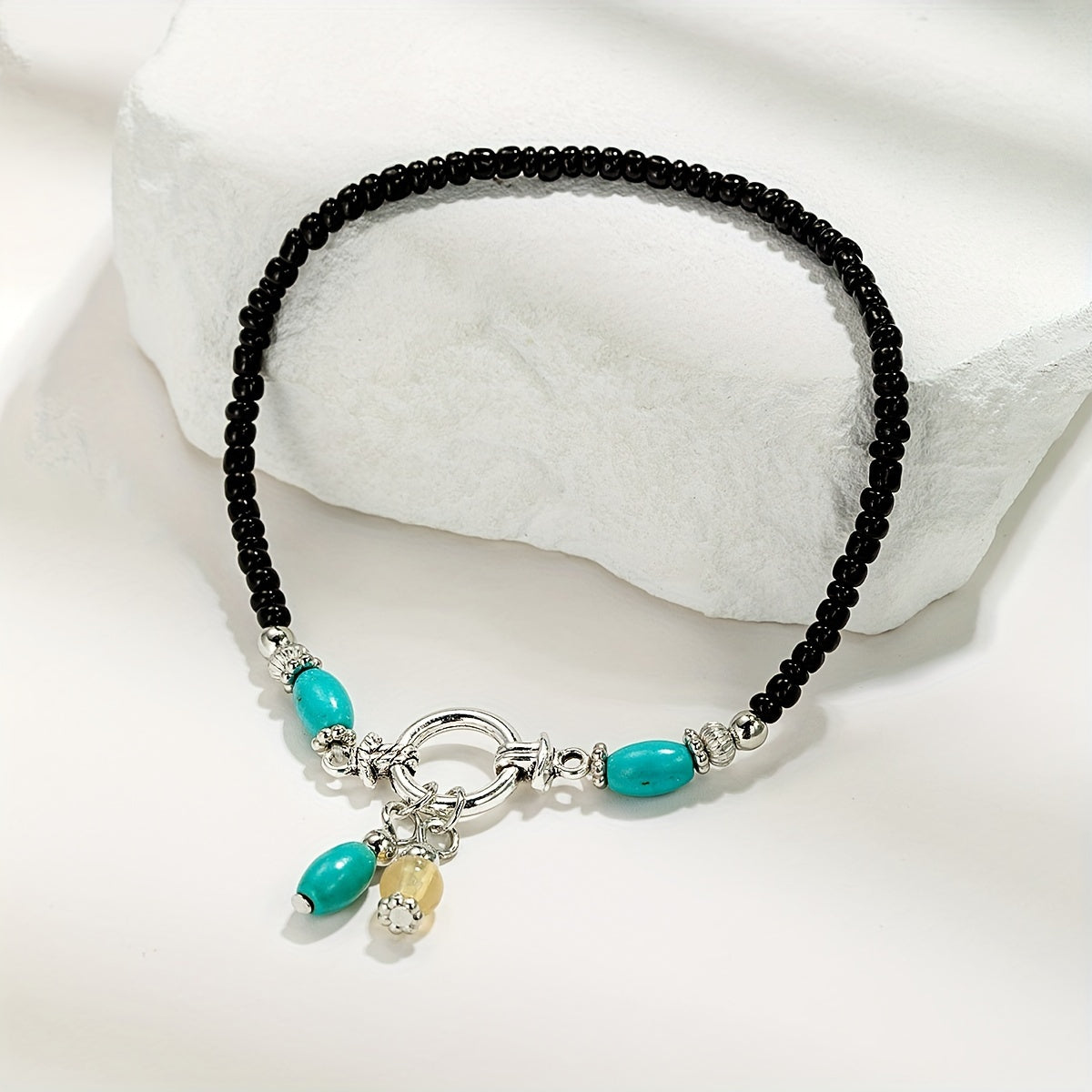 Maëlys | Cheville turquoise à pampilles