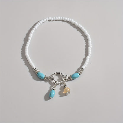 Maëlys | Cheville turquoise à pampilles