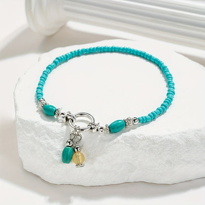 Maëlys | Cheville turquoise à pampilles